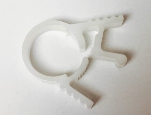 Clamp, injection molded